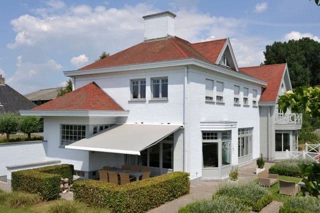 A retractable outdoor awning by Midwest Home Solutions.